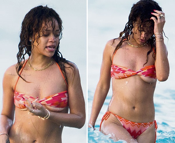 Rihanna in Barbados wearing bikini with boob falling out